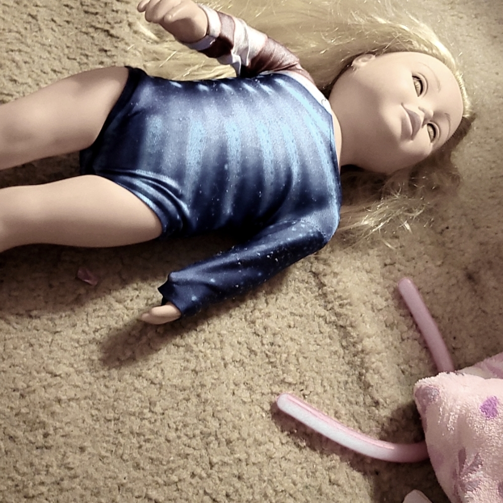 I am selling a gymnast american girl doll